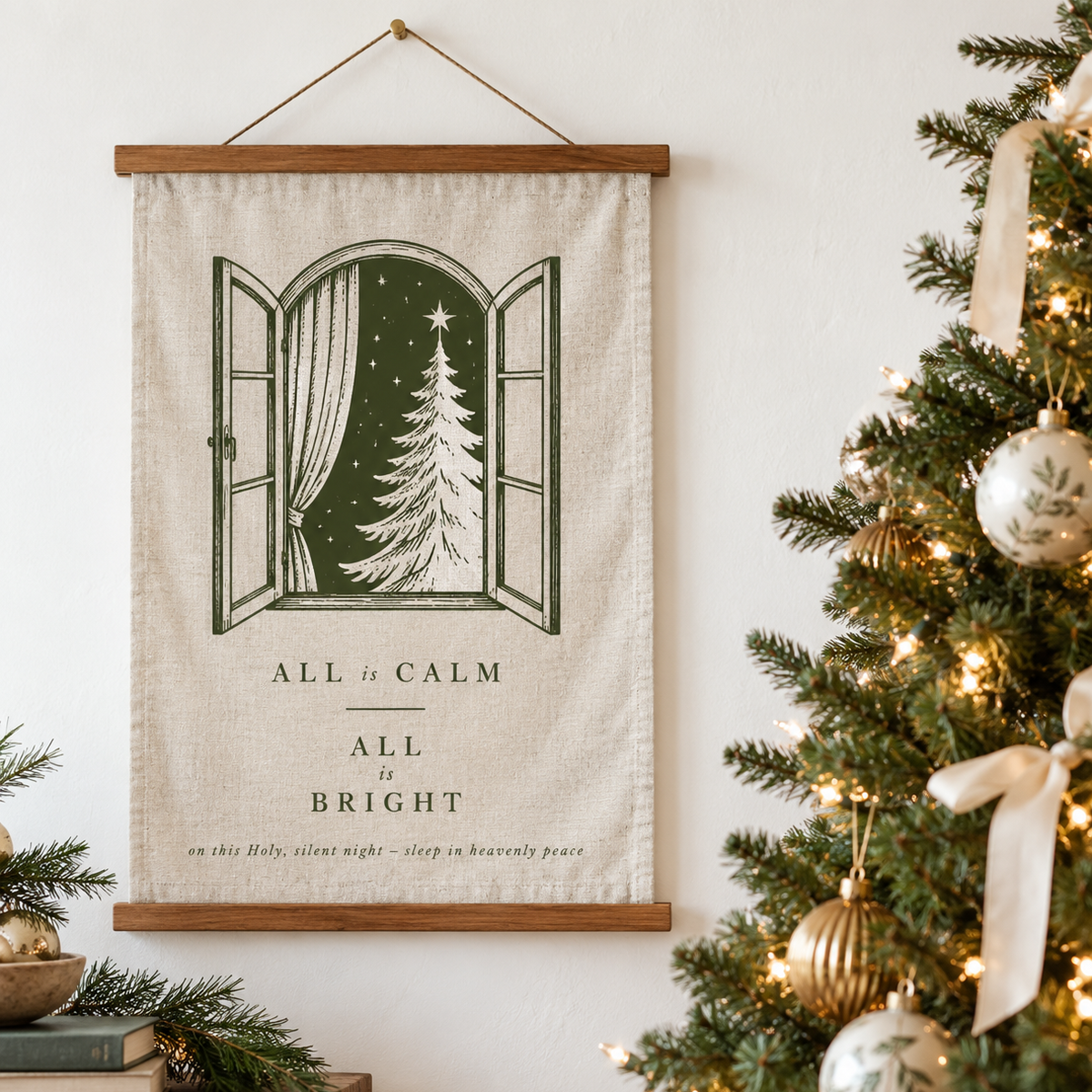 Hanging tea towel featuring words 'all is calm, all is bright' with Christmas tree