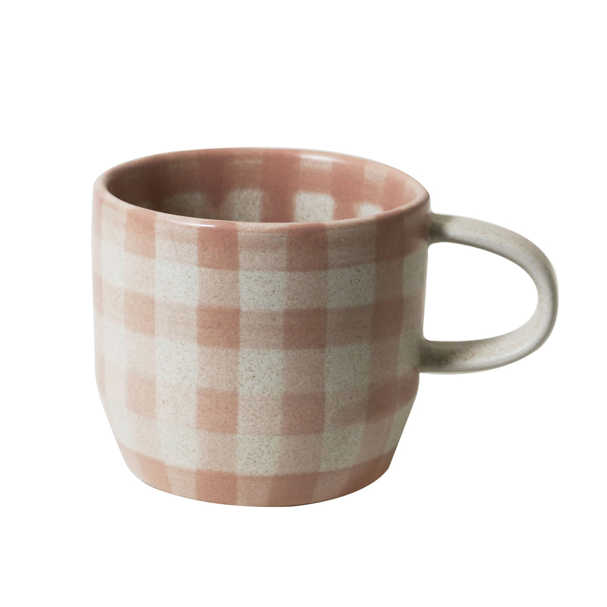 Checkered mug with a pink and beige pattern on a white background