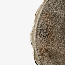 Close-up of a textured surface with a white background