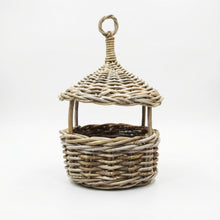 Wicker hanging basket  on a white background