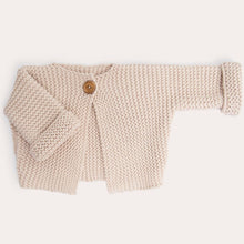 knitted baby cardigan with wooden button