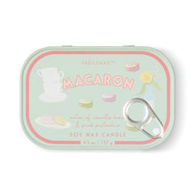 Paddywax Macaron candle tin with colorful macaron illustrations on a white background