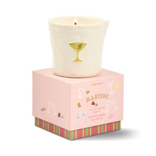 Candle in a decorative pink box with 'Martini' text and cocktail illustrations on a white background.
