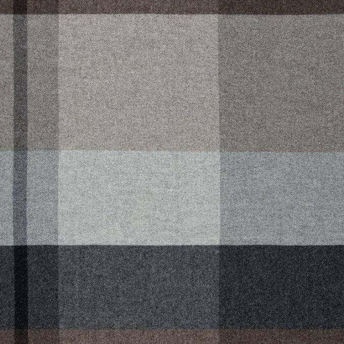 Plaid blanket with gray, brown, and grey colors on a white background