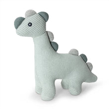 Knitted dinosaur toy on a white background