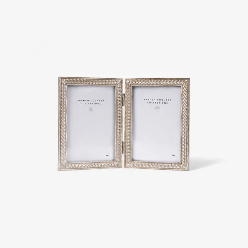 Pair of decorative photo frames on a white background