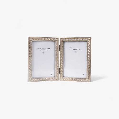 Pair of decorative photo frames on a white background