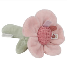 Pink plush flower rattle with green stem on a white background