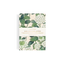 Mini notebook with floral design on a white background
