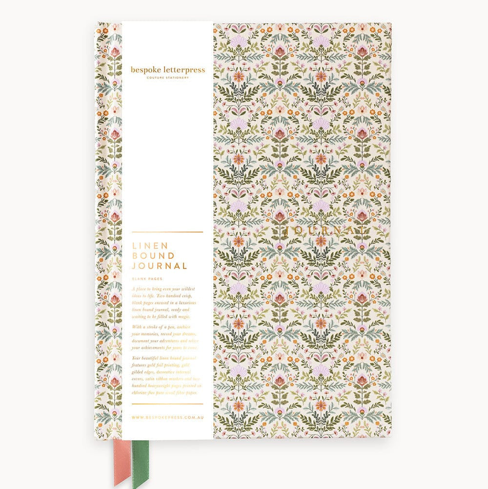 Floral patterned journal with a white label on a white background