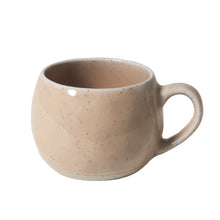 stoneware mug with soft blush glaze