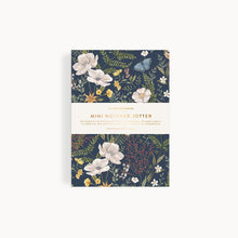 Floral mini notepad with a white label on a white background