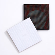 Patterned scarf with white gift box