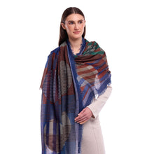 Woman wearing a colorful scarf on a white background