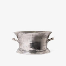 Silver metal champagne bucket with handles on a white background