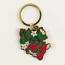 Keychain with strawberry design on a white background