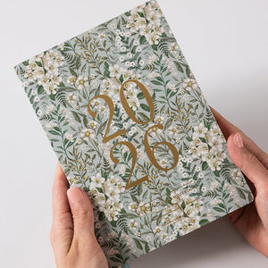 Floral notebook with '2026' on a light background