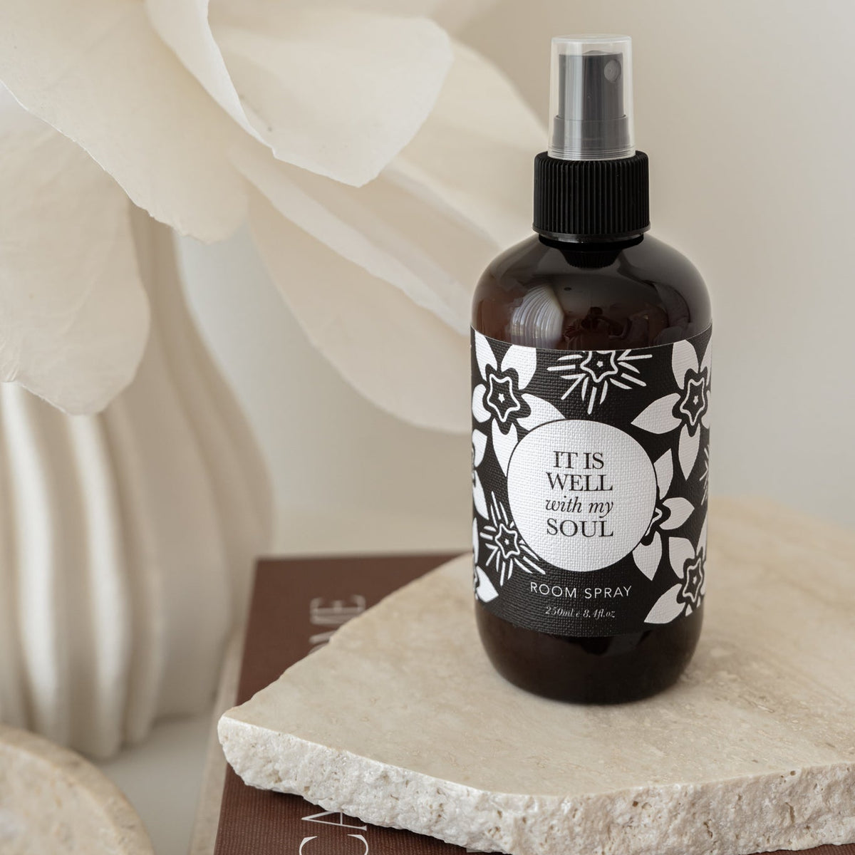 Well Versed Homes Room Spray with label 'it is well with my soul'.