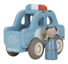 Wooden police car toy with a figure on a white background, branded 'little dutch'.
